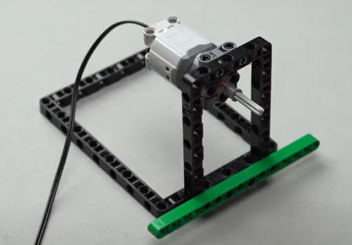 Now onto the body of our spin wheel robot, a STEM robotic project, a Technic full bush is attached onto the axle 5.