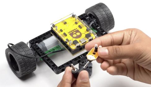 Connecting two proximity sensors to Roboki's Port A and Port B, illustrating sensor integration for obstacle avoidance technology in robotic projects.