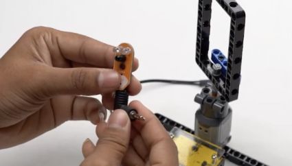 Next, connect the proximity sensor to Roboki using the angled port connector, an essential step in creating an intelligent robot that interacts with its environment.