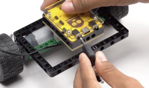 Attaching a proximity sensor to Roboki's Port A showcases the technology behind autonomous robots. This image illustrates the importance of sensor integration in mobile bots and robotic projects, perfect for tech enthusiasts exploring AI in robotics.