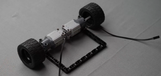 Mounting wheels on the axles for the Follow Me Home robot, enabling smooth autonomous navigation with Roboki and motor-driven movement.