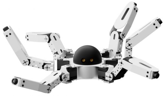 Six legged microcontroller powered Crawl-e robot created by Yudu Robotics moving its legs around showcasing its movement on a white background.