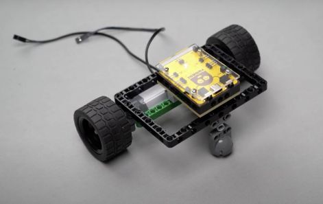 Mounting the Roboki microcontroller on top of the structure, finalizing the Follow Me Home bot’s setup for autonomous robot operation and object detection.