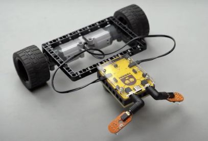 The image showcases a line follower bot constructed using Roboki, proximity sensors, and motors, highlighting the innovative design of this autonomous robot. This hands-on robotics project is perfect for young engineers and tech enthusiasts eager to learn about robotic technology and microcontroller applications in DIY robotics. The integration of proximity sensors enhances its navigation capabilities, making it an engaging example of advanced robotics in action.